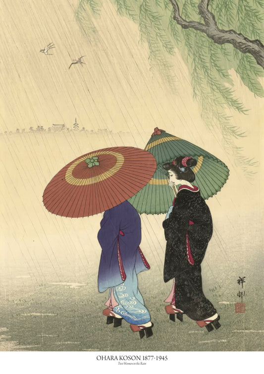 Two women in the rain